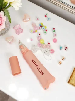 New Błyszczyk do ust z bransoletką Gloss & Charm Cocoa Cookie Usta