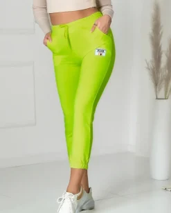 Best Neonowe żółte damskie spodnie dresowe z naszywką- Odzież Spodnie Dresowe