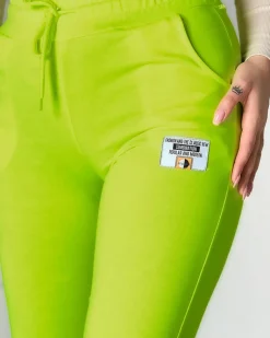 Best Neonowe żółte damskie spodnie dresowe z naszywką- Odzież Spodnie Dresowe