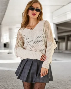 Ażurowy sweter damski z koronką Swetry