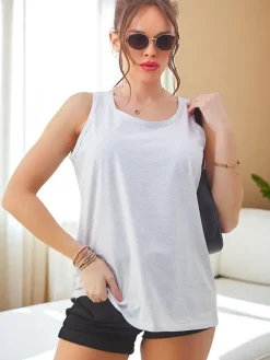 Outlet Bawełniana bluzka bokserka damska na ramiączkach z koronką na plecach Bluzki / Koszule / Koszulki