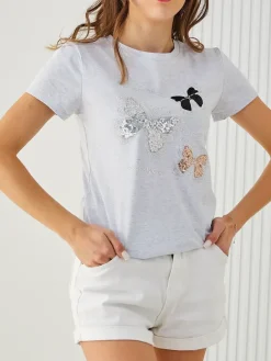 Outlet Bawełniana damska bluzka w motyle Bluzki / Koszule / Koszulki