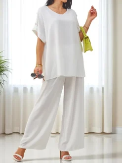 Bawełniany damski komplet z krótkim rękawem i poszerzanymi spodniami Damskie Komplety Damskie