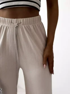 Beżowe damskie szerokie spodnie prążkowane Spodnie Materiałowe