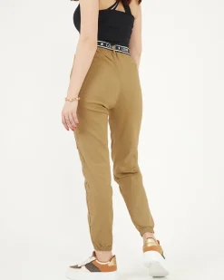 Beżowe damskie spodnie typu bojówki z kieszeniami Spodnie Cargo|Spodnie Materiałowe