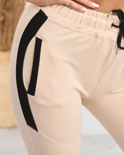 New Beżowe damskie spodnie dresowe z czarnymi wstawkami Spodnie Dresowe