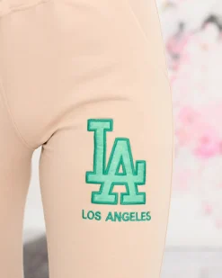 Sale Beżowe damskie spodnie dresowe z kolorową naszywką Spodnie Dresowe