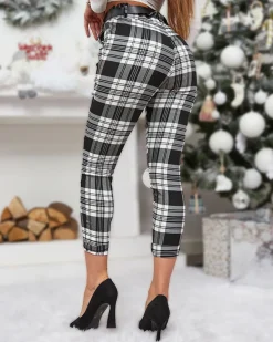 Online Biało- czarne damskie spodnie w kratę Spodnie Materiałowe
