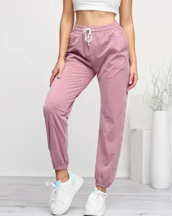 Best Ciemnoróżowe damskie spodnie dresowe typu joggery Spodnie Dresowe