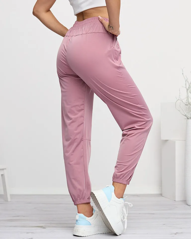 Best Ciemnoróżowe damskie spodnie dresowe typu joggery Spodnie Dresowe