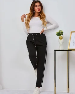 Online Czarne damskie spodnie dresowe z lampasami Spodnie Dresowe