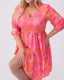 Best Damska sukienka do kolan z printem PLUS SIZE Plus Size