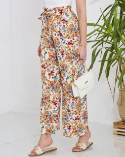 Sale Damskie białe spodnie typu palazzo w pomarańczowe kwiaty Spodnie Materiałowe