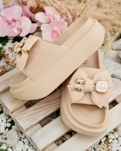 Sale Damskie gumowe klapki z ozdobną kokardką Apis Klapki Płaskie