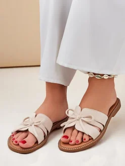 Best Damskie klapki na płaskiej podeszwie z kokardką Gerber Klapki Płaskie