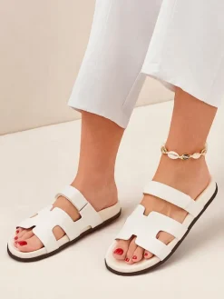 Damskie klapki na płaskiej podeszwie Arian Klapki Płaskie