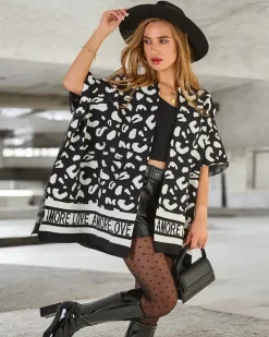 Sale Damskie ponczo z printem Swetry