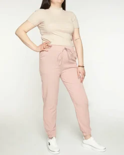 Damskie różowe spodnie materiałowe typu joggery PLUS SIZE Plus Size|Spodnie Materiałowe