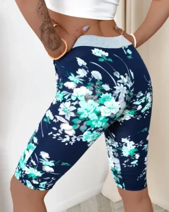 Best Granatowe spodenki damskie 3/4 w zielone kwiaty Spodenki 3/4|Krótkie Spodenki