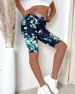 Best Granatowe spodenki damskie 3/4 w zielone kwiaty Spodenki 3/4|Krótkie Spodenki