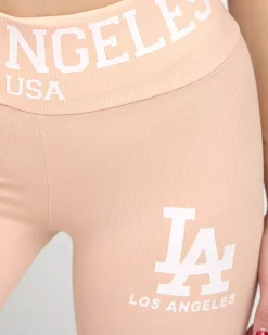 Online Pudrowe damskie prążkowane legginsy z napisami Legginsy / Tregginsy