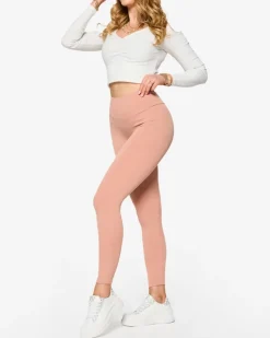 Best Różowe damskie prążkowane legginsy Legginsy / Tregginsy