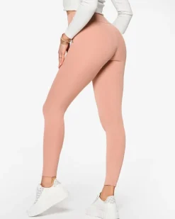 Best Różowe damskie prążkowane legginsy Legginsy / Tregginsy