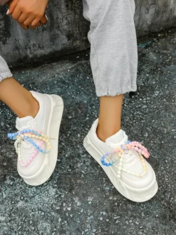 Sportowe sneakersy damskie na platformie z ozdobnymi sznurówkami Funies Damskie Sneakersy