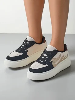 Online Sportowe sneakersy damskie na platformie Sisnes Damskie Sneakersy