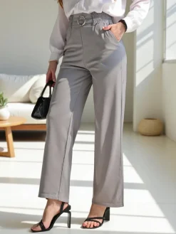 Szerokie spodnie damskie z ozdobną klamerką Spodnie Materiałowe