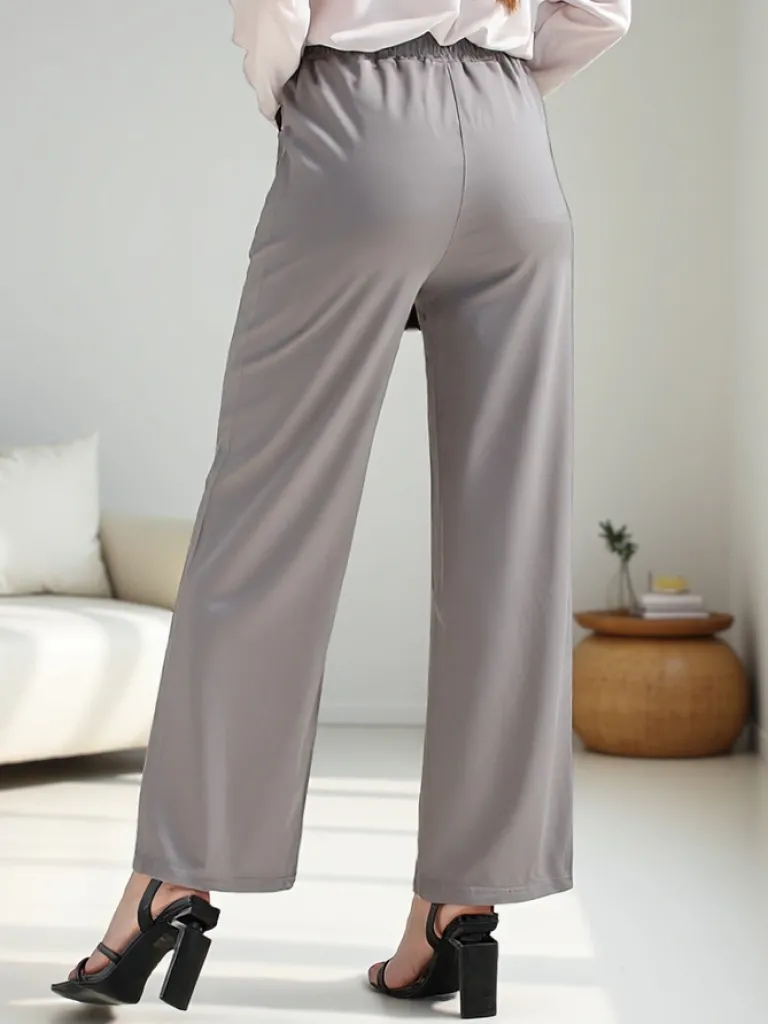 Szerokie spodnie damskie z ozdobną klamerką Spodnie Materiałowe