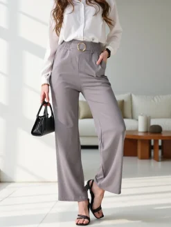 Szerokie spodnie damskie z ozdobną klamerką Spodnie Materiałowe