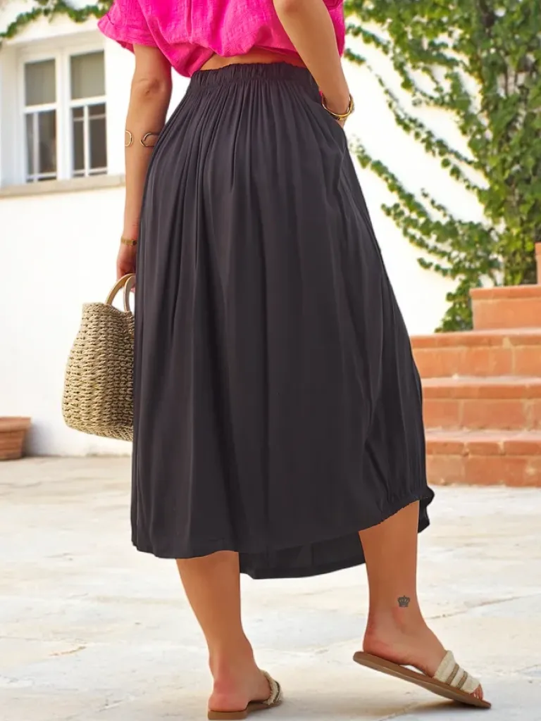 Wiskozowa Damska spódnica midi letnia i zwiewna z dwoma kieszeniami Spódnice