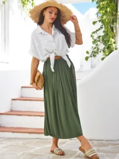 Outlet Wiskozowa Damska spódnica midi letnia i zwiewna z dwoma kieszeniami Spódnice