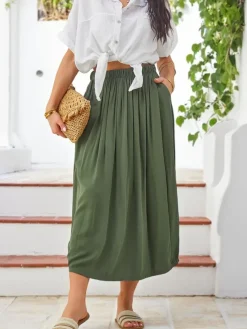 Outlet Wiskozowa Damska spódnica midi letnia i zwiewna z dwoma kieszeniami Spódnice