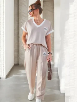 Outlet Wiskozowy damski komplet z krótkim rękawem i poszerzanymi spodniami Damskie Komplety Damskie