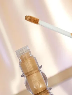 Rozświetlacz do twarzy w płynie z pędzelkiem Golden Petal Twarz