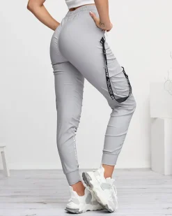 Szare damskie spodnie typu bojówki z napisami - Odzież Spodnie Cargo